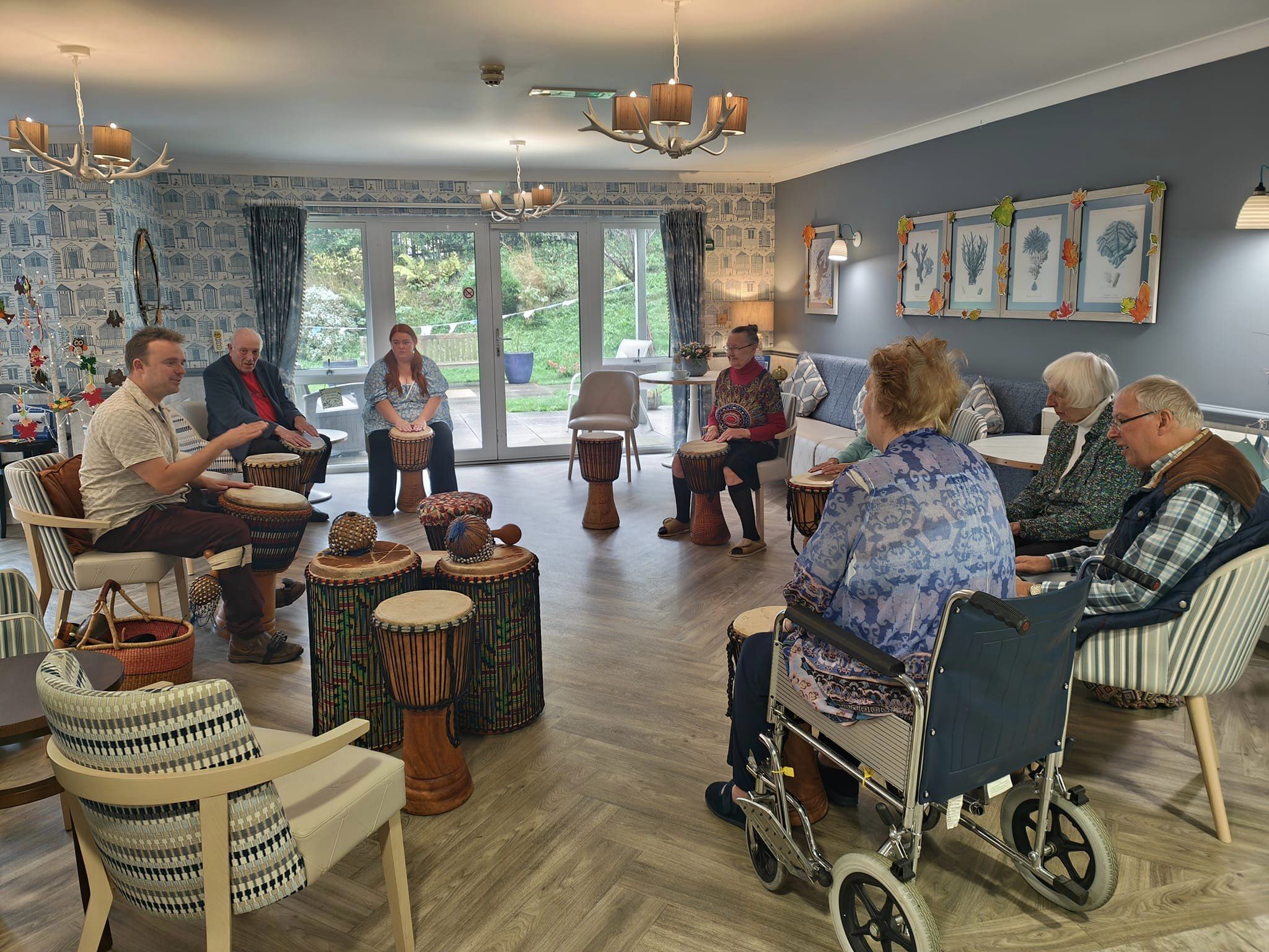 Residents enjoy a drumming session