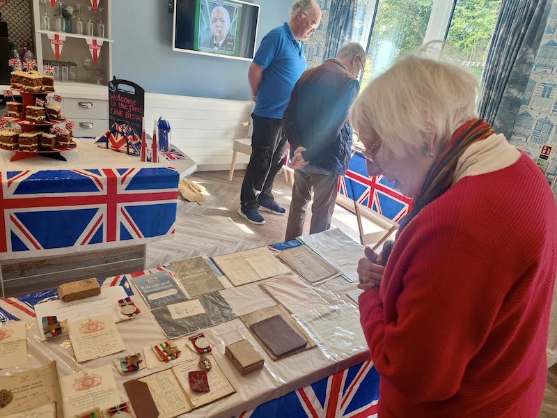 one of our residents looking at war memorabilia