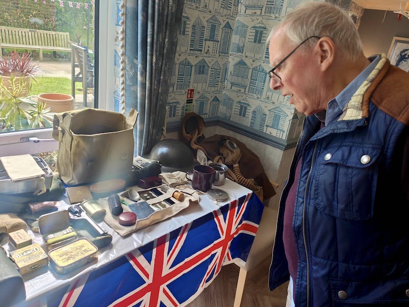 one of our residents looking at war memorabilia
