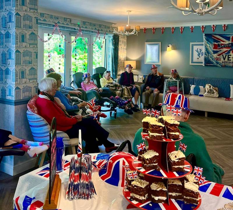 residents celebrating VE day in our lounge