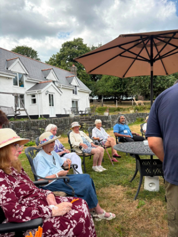 Residents from The Fleet Care Home enjoying time outdoors at the alpaca farm